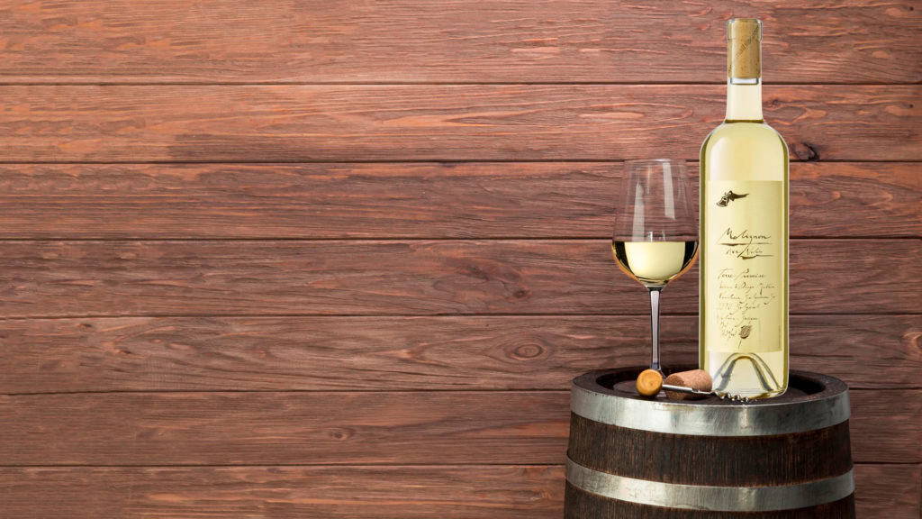 Fendant Weisswein Molignon auf einem Barriquefass